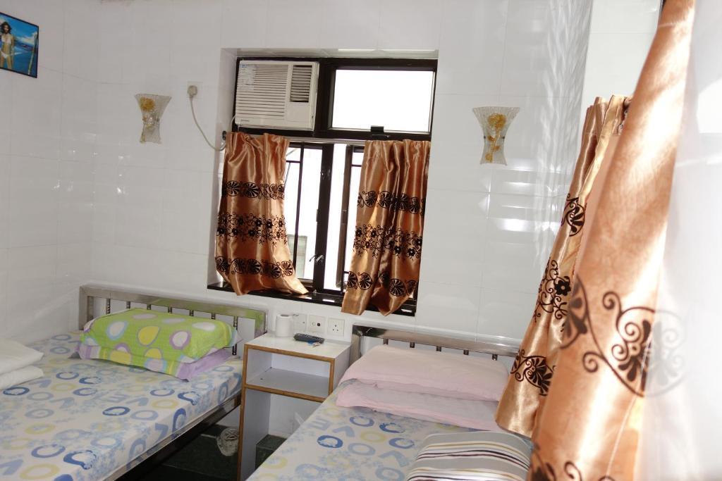 New China Guesthouse Гонконг Номер фото